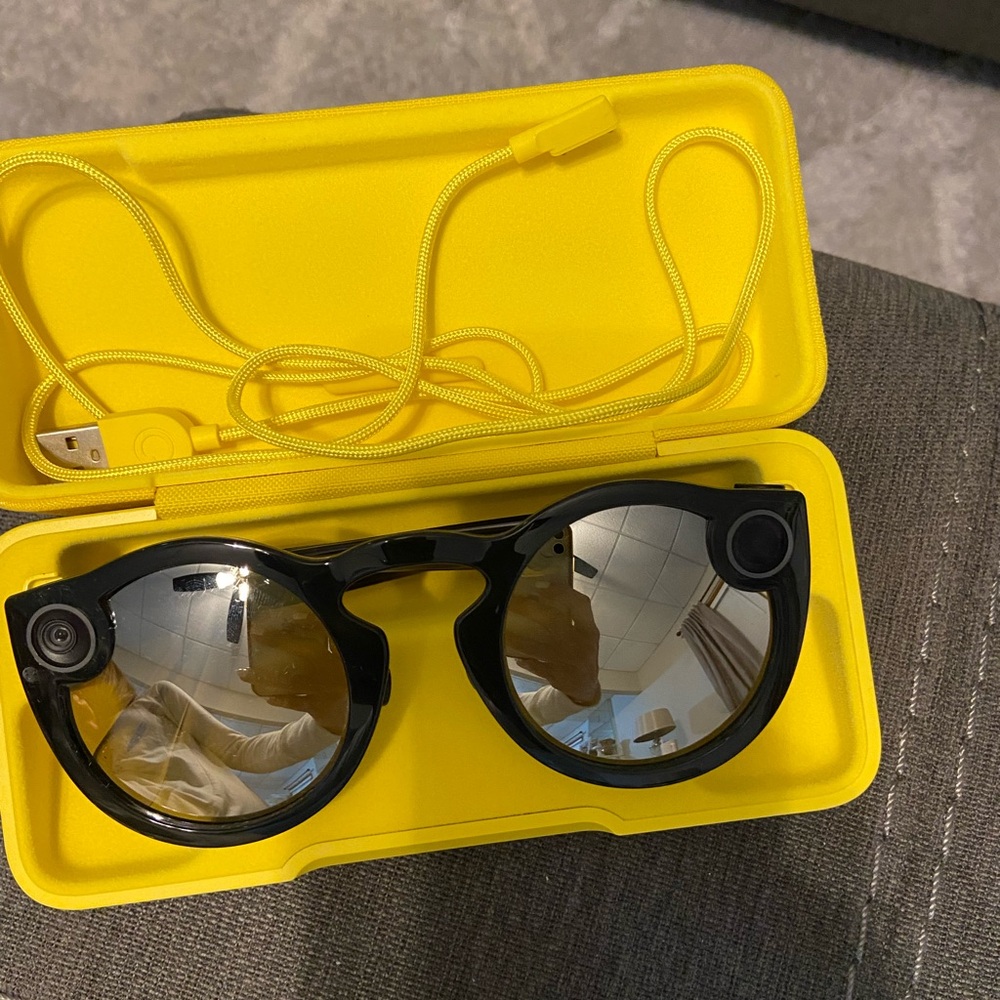 Black Smart Glasses with Yellow Case
Snap spectacles with charging cord and case